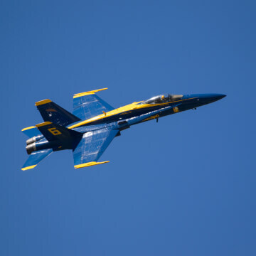 Lieutenant Tyler Davies (USN), flying Blue Angel #6, does a few flybys bright and early.