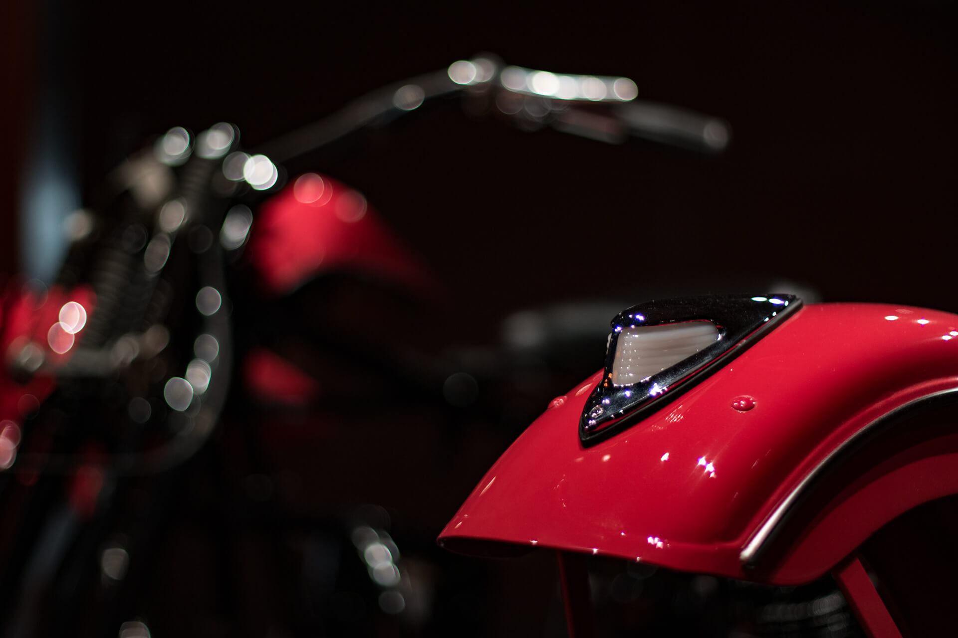 This particular museum exhibit had a dissected motorcycle split into numerous sections. From one angle, it looked as-one, but walking around it, you could examine each piece separately.